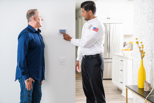 Service Minds One Hour tech performing Thermostat installation service in Miami, FL